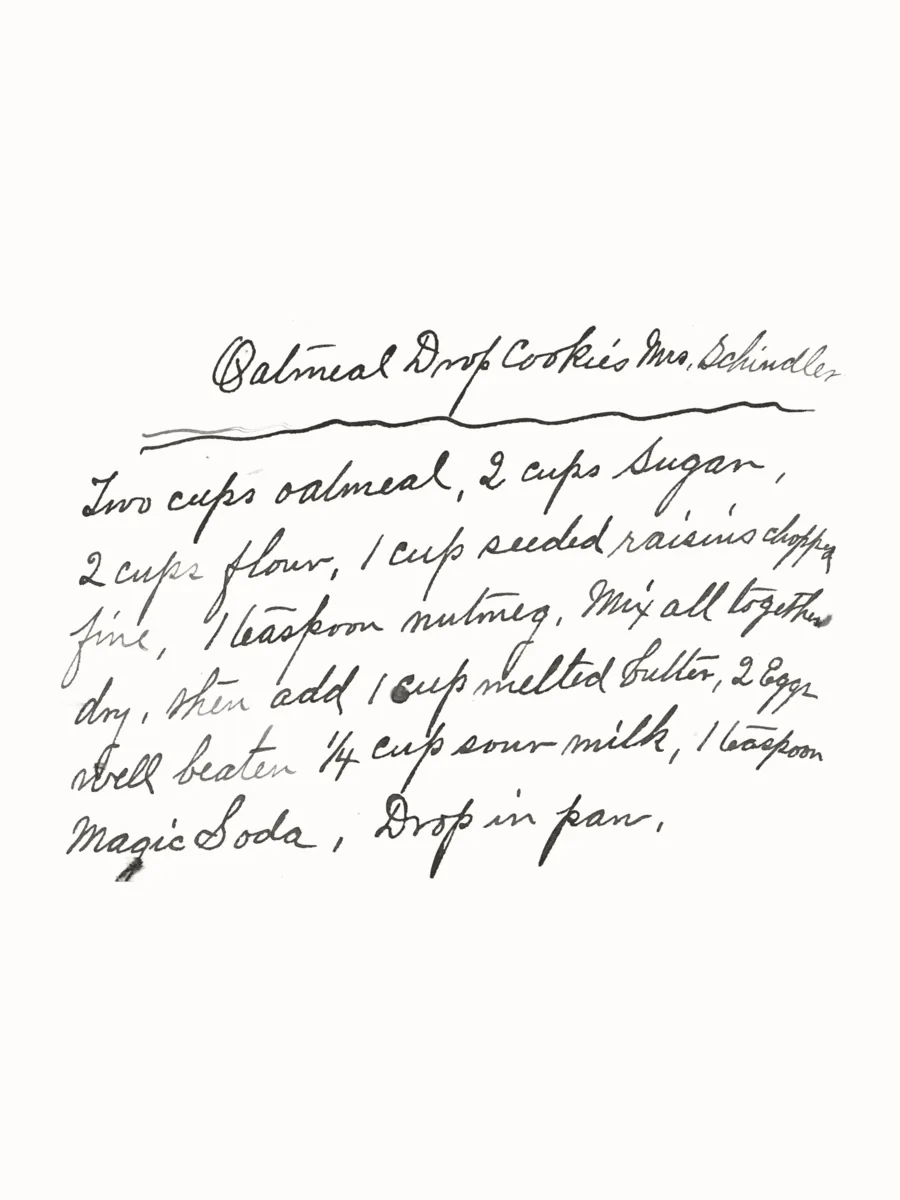 A handwritten oatmeal cookie recipe in charcoal on warm white